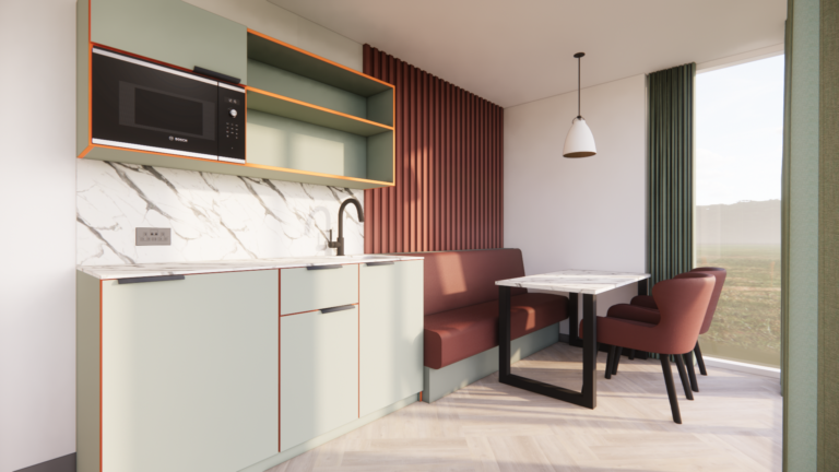 Kitchenette with sage green units, burgundy panelling and dining table by the window